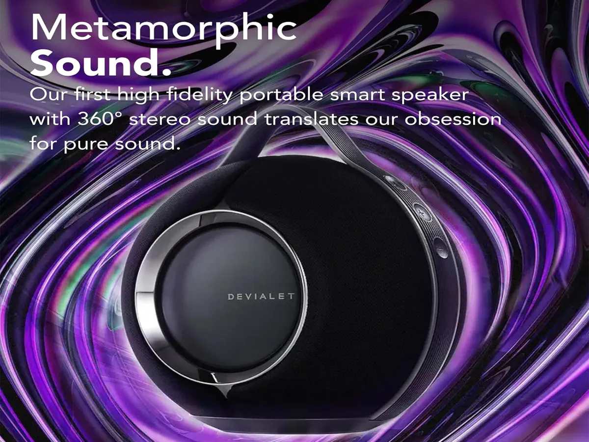 Devialet Mania portable smart speaker in deep black finish on a modern table