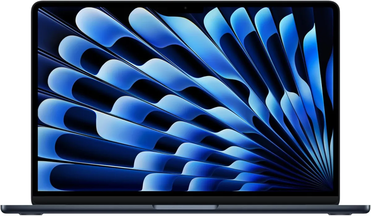 Apple MacBook Air with M4 chip in Midnight finish on a minimal workspace
