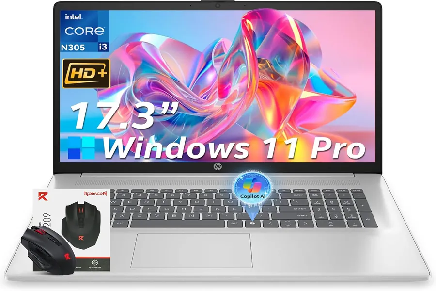 HP laptop on office desk with planner and wireless mouse
