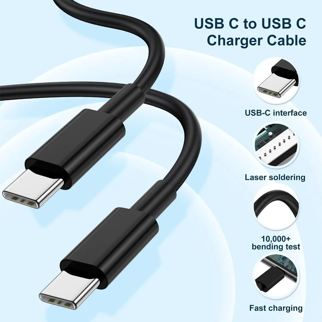 Jeenek USB-C fast charger on desk beside phone and daily accessories